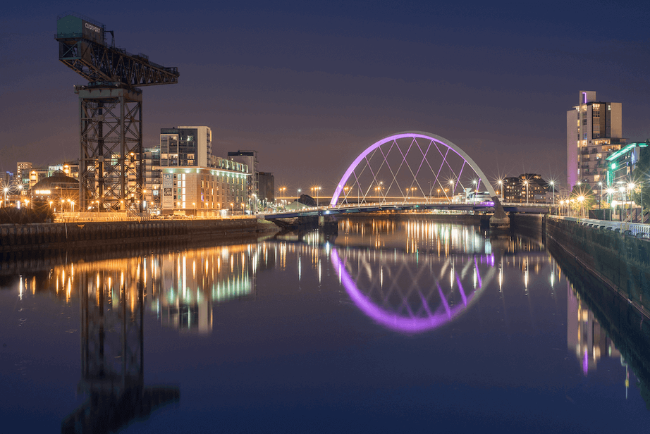 The river clyde with the famous Clyde arc and the Finnieston crane in the background
