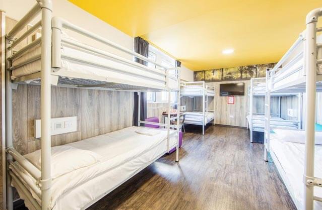Four bunkbeds inside a room at Euro Hostel Glasgow